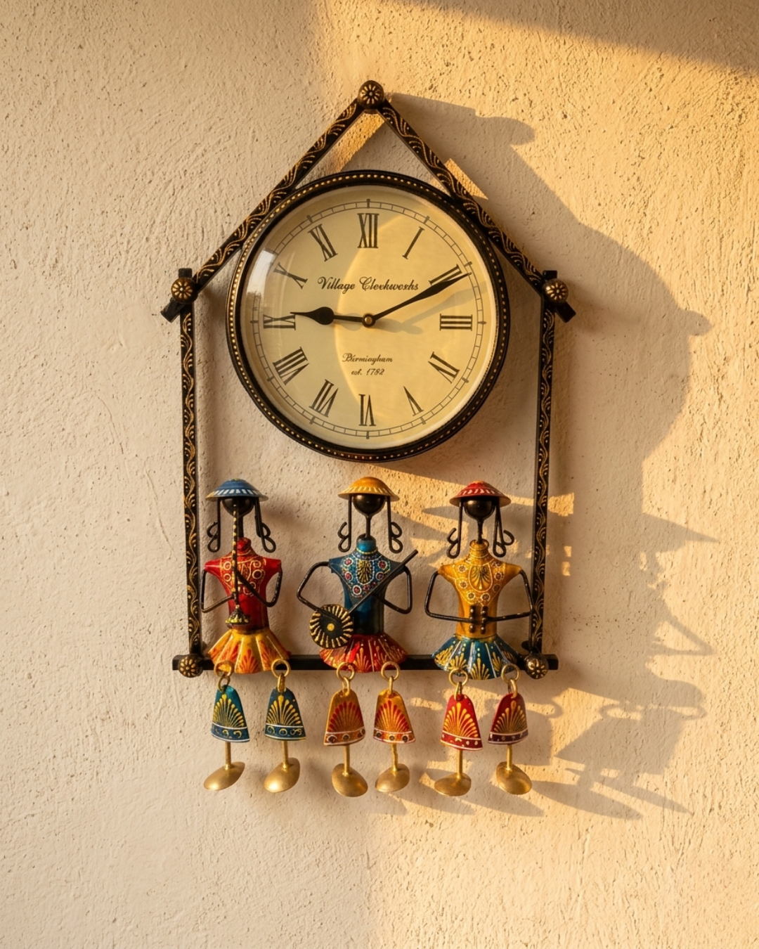 Designer metal wall clock with traditional Rajasthani folk art figures