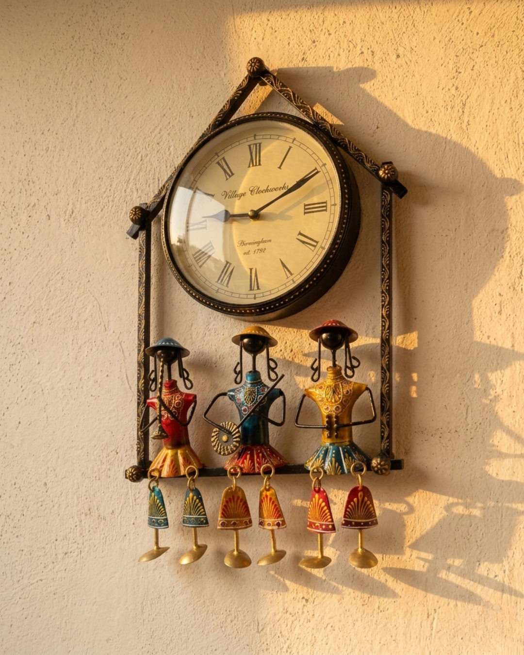 Handcrafted Rajasthani folk art figurines on decorative metal wall clock